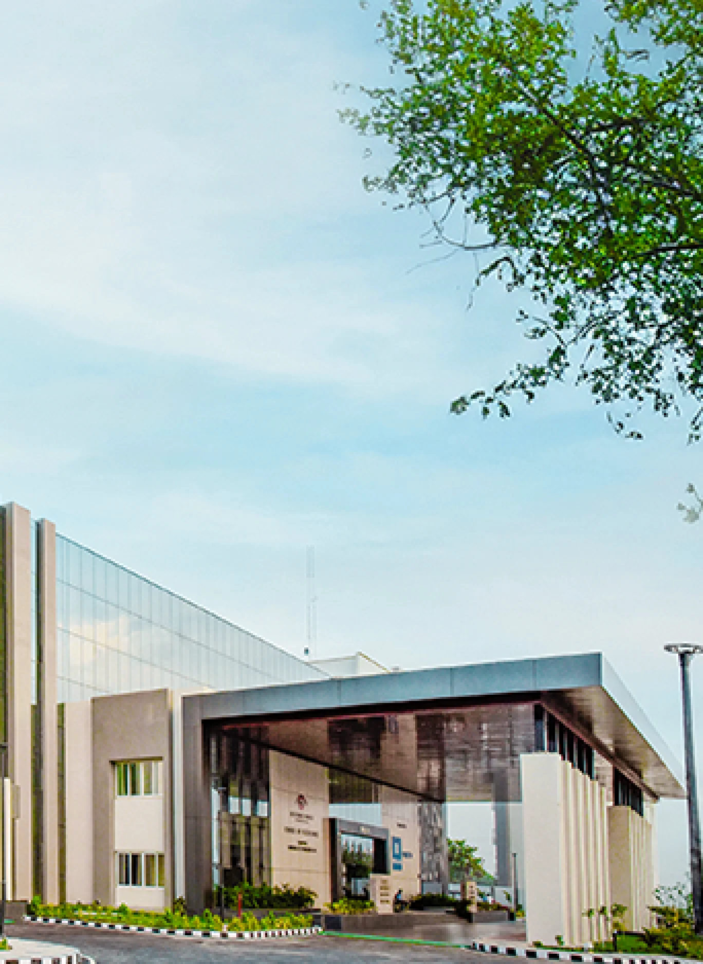 Centre of Excellence - Modern multi-story building with glass facades